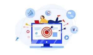 Kobieta na laptopie nad monitorem z tarczą. Wokół strzałki, ikony social media, wykresy. Skuteczny marketing i linki zewnętrzne.
