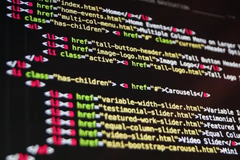 ```json
{
  "alt_text": "Kod HTML z linkami do różnych sekcji strony, w tym 'Carousels', 'Video Slider' i 'Mini Slider'."
}
```