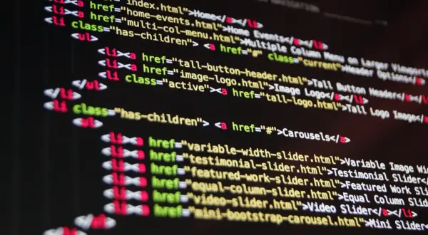 ```json
{
  "alt_text": "Kod HTML z linkami do różnych sekcji strony, w tym 'Carousels', 'Video Slider' i 'Mini Slider'."
}
```