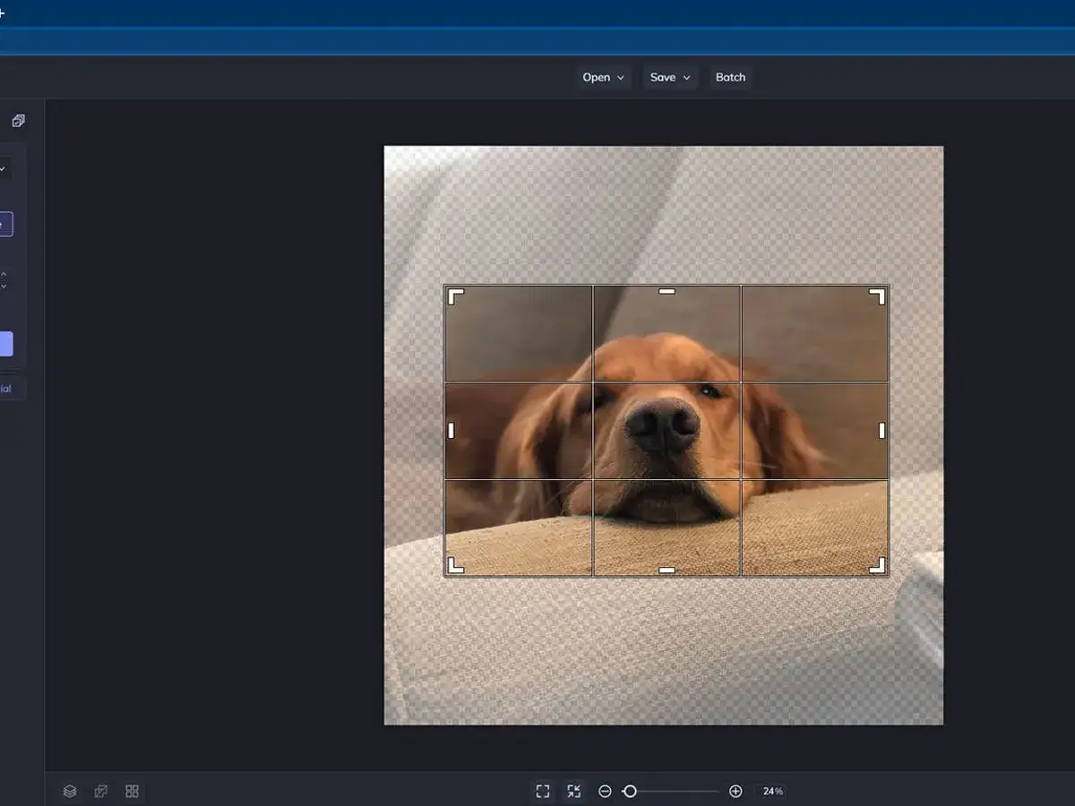 Zmiana pixeli zdjęcia: uroczy golden retriever leży na kanapie, widoczny podział na siatkę do kadrowania.